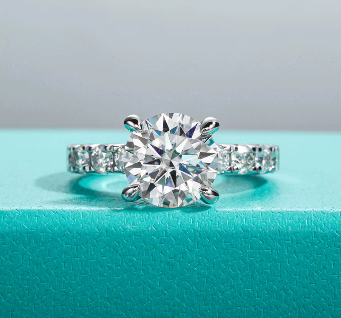 “Elegant Lyandra Gems gold ring with green gemstone”